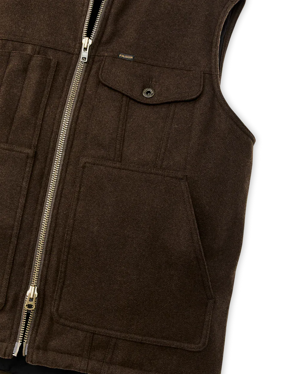 Close-up of a dark brown wool vest with a front zipper, a buttoned flap pocket, and a large front patch pocket on a white background.