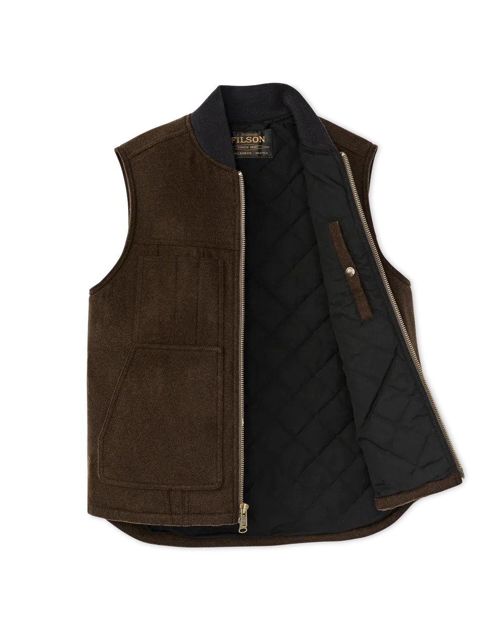 A brown suede vest with a black quilted lining, shown open against a plain white background. The brand name 'FILSON' is visible on the inner neck label.